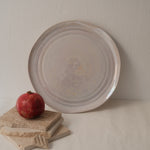 Round waves serving plate